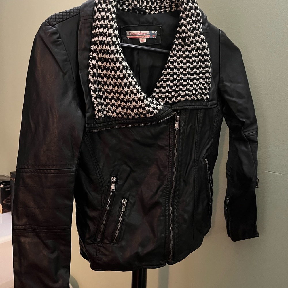 Black leather like jacket.